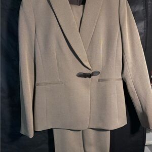 Elegant Tan Women’s Tahari pantsuit.